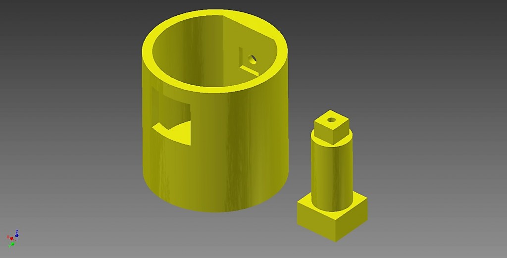 Fig. 2: This part consists of a 6 mm x 6 mm square-bottom parallelepiped, a 10 mm diameter cylinder and a 12 mm x 12 mm square-bottom parallelepiped. The pin is inserted on the side of the small parallelepiped through a 12 mm x 12 mm hole; inside it will be matched to the connecting rod along the cylindrical section and then will fit onto a flat protrusion purposely generated inside the cylinder.